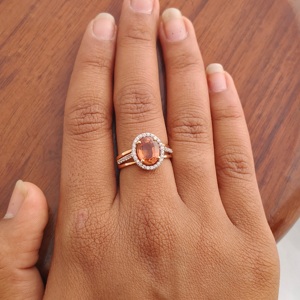 แหวนหมั้นทองคำขาว 18K ประดับไพลินสีส้มรูปวงรี ดีไซน์วงแหวนแบบ Halo สำหรับผู้หญิง ประดับเพชร แหวนแต่งงานแบบแยกส่วน งานจิวเวลรี่ชั้นดี - Product Image 5