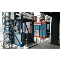 Monte-charge de chantier à double cabine de 2 tonnes pour matériaux de construction et ascenseur de passagers