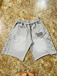 Shorts amples en molleton 100 % coton Gucha Sports pour hommes, avec logo frontal, bords bruts et taille élastique, écologiques, vente en gros - Product Image 2