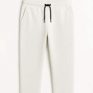 กางเกงวอร์มผ้าฝ้ายผสมไนลอนสั่งตัดไซส์ได้ แห้งเร็ว ไม่ยับ ไม่เป็นขุย ดีไซน์ทรงคาร์โก้ขาบาน รับผลิตแบบ OEM ODM - Product Image 5