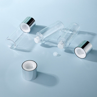 Flacon transparent avec bouchon à vis argenté métallique pour tonique facial et eau, avec réducteur intégré