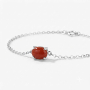 Bracelet à maillons classique en argent sterling plaqué rhodium Rhaya Jewels, serti de corail ovale, pour enfants et unisexe - Product Image 1