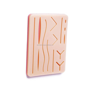 Coussin d'entraînement à la suture en silicone réutilisable avec 14 plaies réalistes, équipement de formation médicale et chirurgicale, fournisseur en gros - Product Image 2