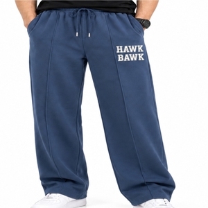 Pantalon décontracté pour homme, couleur unie, coupe ample, taille à cordon de serrage, avec poches latérales - Product Image 1