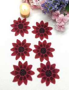 A set of 6 handmade red flower-shaped beaded coasters. - Product Image 2