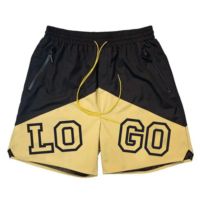 Shorts de sport pour homme en nylon bicolore, style décontracté, 100% polyester, pour la gym et la course à pied