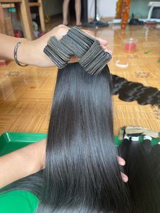 High Quality Double Drawn Burmese Curly Style Vietnamese Human Hair Tape in Hair Extension Natural Wave Style <b>Its</b> Natural Color - Product Image 2