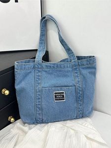 Urban Explorer Blue Denim <b>Tote</b> <b>Bag</b> For Women Large Capacity Cotton Fabric Shoulder Handbag With Bold White <b>Graphic</b> Print - Product Image 4