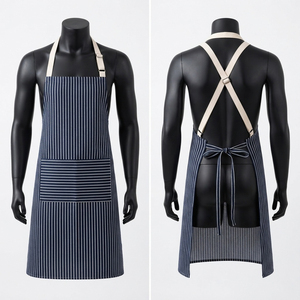 Delantal de Chef Unisex de Lona de Algodón Premium de 240 GSM, Manga Corta, Cierre a Presión, Rayas Blancas sobre Azul Marino, Bolsillo Frontal, Tirantes Cruzados en la Espalda - Product Image 1