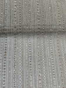 Tissu en mousseline de soie lourdement brodé avec des motifs miroir, des perles et des paillettes pour robe - Product Image 1