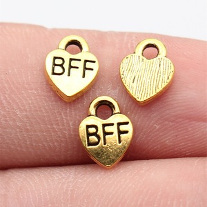 Amuleto de Corazón BFF de 9.3x7mm en Tono Dorado, Aleación de Zinc, Símbolo de <span class=keywords><strong>Amistad</strong></span> para Tirador de Cremallera de Mochila - Product Image 1