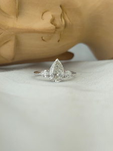 Pear Cut Diamond Ring Side <b>Stones</b> in White Gold a graceful blend of elegance and brilliance with radiant sparkle luxury - Product Image 3