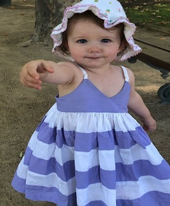 Adorable Girl's Summer Wear Lavender & White Stripe Cotton Dress With <b>Big</b> White <b>Bow</b> Tie At Back & Adjustable Shoulder Strap - Product Image 1