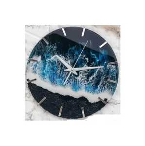 Reloj de Pared Artesanal de Madera de Olivo con Borde Natural y Resina Oceánica Tricolor con Incrustaciones en Blanco Perla, Verde Azulado y Azul Marino. - Product Image 3