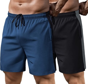 Pantalones cortos deportivos de secado rápido para hombre, color sólido, cintura con cordón y bolsillos, ropa deportiva de tiro medio, azul y negro - Product Image 4