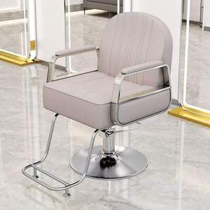 Sillón de diseño reclinable giratorio de alta gama para salón, silla de peluquería de cuero - Product Image 3