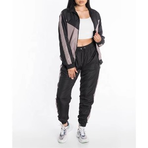 Conjunto de 2 piezas de chándal cortavientos para mujer, estilo casual, antiarrugas, de moda, superventas, precio económico, con personalización. - Product Image 1