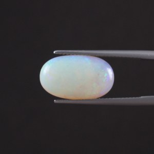 โอปอลสีขาวคุณภาพสูง น้ำหนัก 4.82 กะรัต รูปทรงวงรี ขัดเงาด้วยมือ ผ่านการรับรองจาก IGI  ขนาด 17.5x10.5 มม.  ผ่านการเคลือบด้วยน้ำมัน/แว็กซ์ - Product Image 1