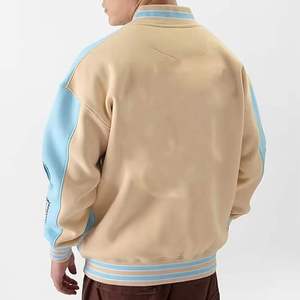 Chaqueta Varsity Unisex Premium Azul Cielo y Crema con Cierre de Botones a Presión, Cuello, Puños y Dobladillo de Punto Acanalado, Forro Polar Suave - Product Image 6