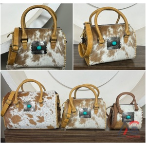 กระเป๋าเดินทางหนังวัวแท้ลายตะวันตกแบบมีหูหิ้ว รุ่น Speedy Duffel Bag ประดับ Concho สำหรับงาน March Expo 2026 ลายพรีเมียม เหมาะสำหรับผู้หญิง - Product Image 1