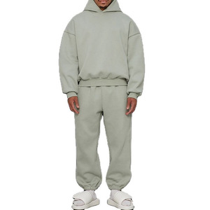 Men's premium performance tracksuits. Sleek athletic sets featuring full-zip hoodies or pullovers with matching <b>joggers</b>. - Product Image 1