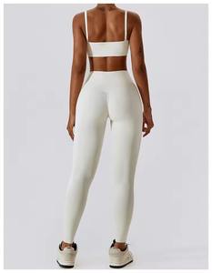 Leggings y Sujetador Deportivos de Yoga para Mujer, Diseño Nuevo y Moderno, Venta al Por Mayor, Sin Costuras, Alta Elasticidad, Color Sólido, con Bolsillo - Product Image 2