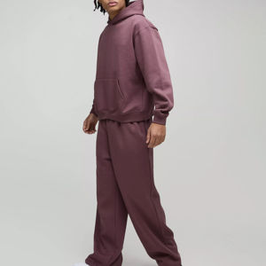 Sweat-shirts de sport surdimensionnés pour hommes avec poches kangourou et pantalons de jogging amples à jambes larges, ensembles de survêtements 2 pièces - Product Image 1