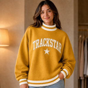 เสื้อสเวตเชิ้ตคอเต่าผู้หญิง Mustard Cream Center Band Trackstar สีไอวอรี่ ลายตัวอักษรดาว โลโก้สั่งทำ แบรนด์ส่วนตัว ขายส่ง - Product Image 1