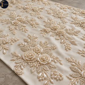 Tissu de robe brodé de perles d'ivoire avec des motifs floraux dimensionnels et des détails de perles en forme de feuilles |   Textile décoratif pour robes de mariée - Product Image 1