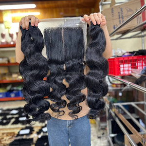 Perruques brésiliennes en cheveux humains vierges en gros, avec dentelle frontale, couleur et texture personnalisables, ondulations naturelles, pointes pleines - Product Image 1