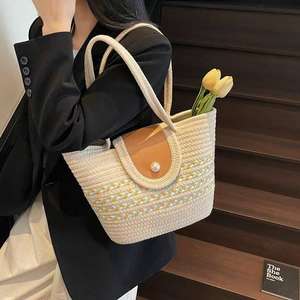 Nouveau sac seau en paille tressée pour femme, style vintage, sac à bandoulière avec une seule sangle pour les vacances - Product Image 1