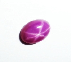 Rubis étoilé ovale 5x7mm 1 carat, cabochon poli créé en laboratoire avec effet étoile à 6 branches pour la fabrication de bijoux - Product Image 2