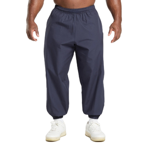Pantalon de survêtement décontracté en nylon imperméable de haute qualité pour hommes, avec logo personnalisé et détails de passepoil, respirant, coupe-vent, vente en gros - Product Image 1