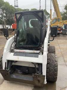 Chargeuse compacte sur pneus Bobcat d'occasion S300 S160 S450 4x4 avec godet - Product Image 4