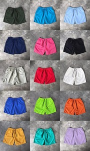 Shorts unisexe à cordon de serrage, couleur unie, séchage rapide, taille mi-haute, décontracté, en polyester tissé, coloris rouge, vert, rose, jaune, noir, fourniture OEM - Product Image 6