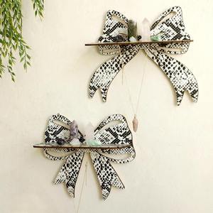 Étagère murale de luxe en forme de nœud, motif peau de serpent noir et blanc, pour l'affichage de cristaux, le rangement de bijoux et la décoration artistique moderne de la maison - Product Image 1