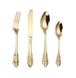 Ensemble de couverts en acier inoxydable de qualité supérieure, aux tons chauds, avec manches en céramique, l'éclat élégant rehausse l'ambiance générale de la table. - Product Image 3