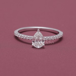 IGI Certified Pear Cut <b>Diamond</b> Solitaire <b>Ring</b> with Pavé Band in 14K Yellow / Rose & White Gold - Product Image 1