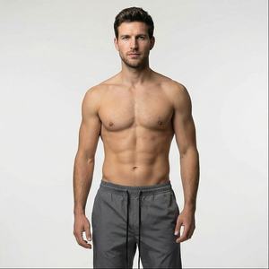 Pantalones impermeables de nailon con estampado de logotipo personalizado Popular de primavera, pantalones para correr de gran tamaño para hombre, pantalones cortavientos para correr con forro de malla - Product Image 1