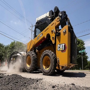 Cargadora compacta CAT con orugas de goma, motor potente, construcción compacta, máquina para trabajos pesados, rendimiento confiable en el sitio. - Product Image 4