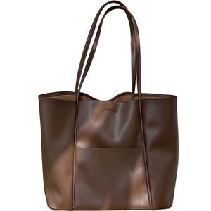 Bolso tote extragrande de cuero genuino con asas marrones, estilo minimalista de apertura superior para uso diario. - Product Image 1