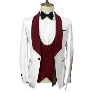 Costume de smoking trois pièces blanc contrastant pour homme avec gilet rouge, idéal pour événements spéciaux, spectacles et mariages - Product Image 1
