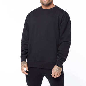 Sweat-shirt à col rond en coton noir pour homme, coupe classique, couleur unie, manches longues avec poche avant, vêtement d'automne - Product Image 1