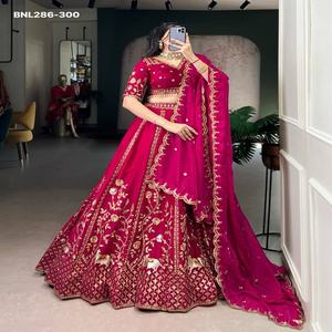 Ensemble Lehenga Choli et Dupatta en soie de qualité supérieure, magnifiquement orné de paillettes et de broderies, disponible en ligne en Inde - Product Image 1