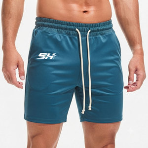 Pantalones cortos deportivos de color azul para hombre, antiencogimiento, textura suave, tela mezclada, bolsillos laterales y traseros, servicio OEM. - Product Image 1