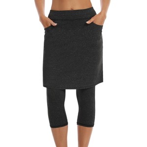 Ensemble de leggings pour femmes, jupe courte décontractée, couleur unie, tricotée, taille élastique avec poches, respirante, en spandex et polyester, pour toutes les saisons - Product Image 1