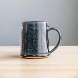 Taza de café de cerámica de gran venta con esmalte azul reactivo, acabado brillante y asa resistente para uso diario en el hogar u oficina. - Product Image 1