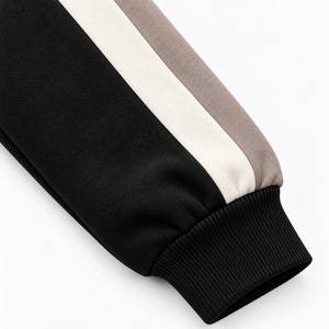 Sudadera negra para mujer con rayas en contraste y paneles de manga en blanco y taupe, cuello redondo oversize, puños acanalados, top deportivo informal para el día a día. - Product Image 4