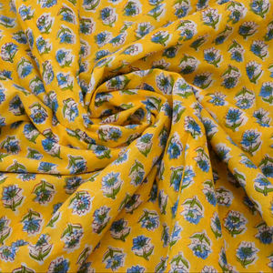 Tissu en coton jaune imprimé à la main style Jaipuri, motif floral, doux et respirant, tissu indien au mètre pour robes et couvertures. - Product Image 1