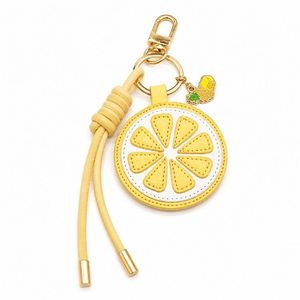 Llavero Personalizado de Cuero PU con Colgante Esmaltado de Frutas - Product Image 3